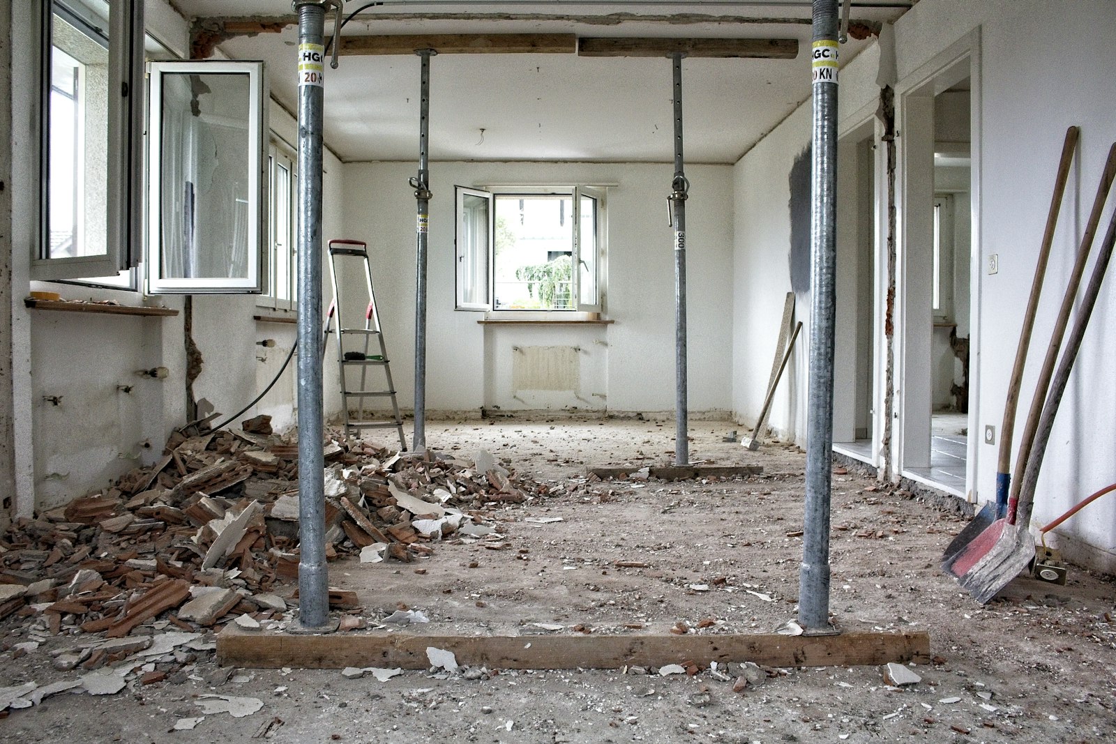 Room stripped back to structure with temporary propping